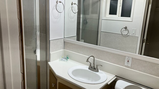 Building Photo - Long term rental with garage and large bac...