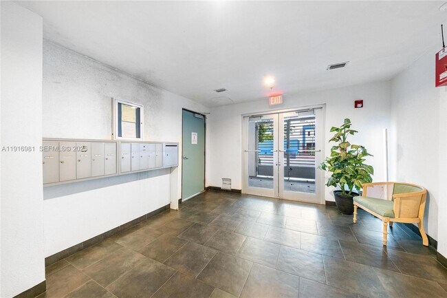 Building Photo - 7700 Collins Ave