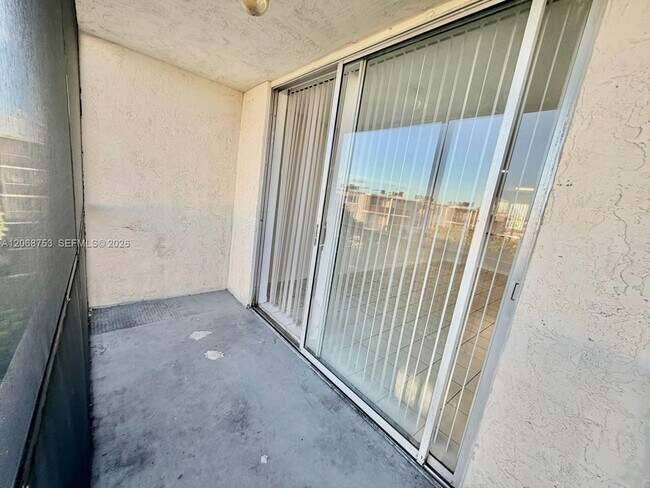 Building Photo - 8750 N Sherman Cir