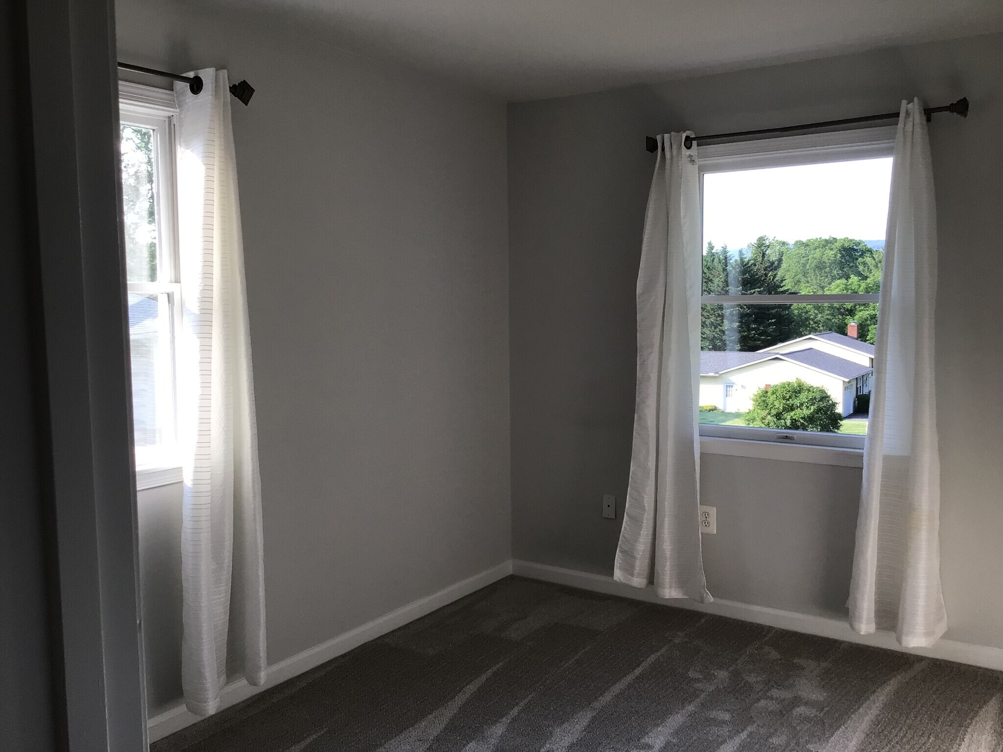 White curtains in newly carpeted and painted bedrooms included - 7288 Beechtree Ln