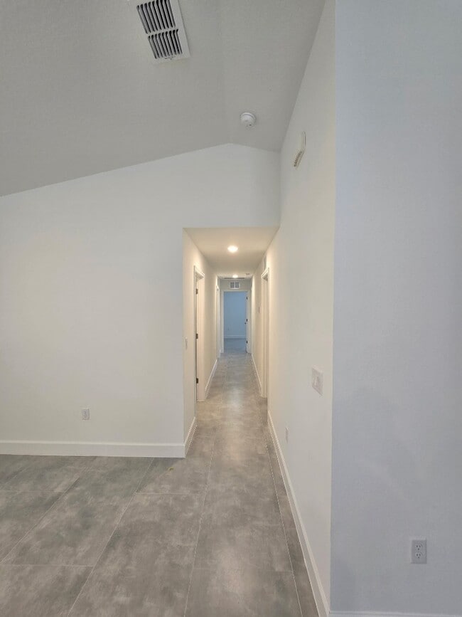 Building Photo - Brand-New 4-Bed Beauty with Attached Garage in Palm Bay – Modern Comfort, Prime Convenience!