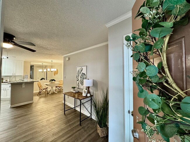 Building Photo - REDUCED PRICE! Updated 1st Floor/1-Level Condo Ready NOW! Includes Water, Sewer, Trash, Landscapi...