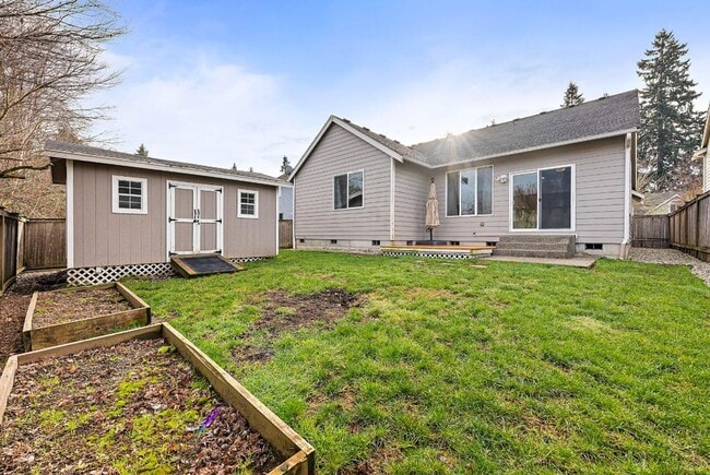 Building Photo - Beautiful Single-Story Olympia Home with Dog Wash, Garden Beds & Thoughtful Layout