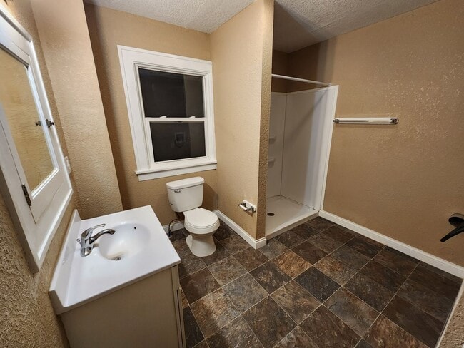 Building Photo - 4 Bedroom, 2 Bathroom home with large yard...