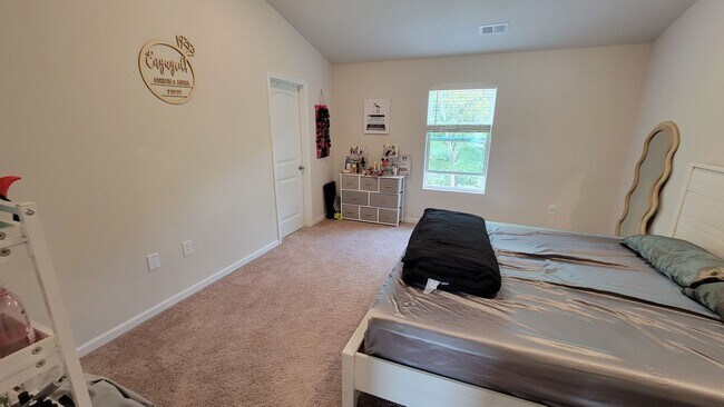 Building Photo - Located in Creedmore Hills a 4BR/2.5BA home with 2 car garage