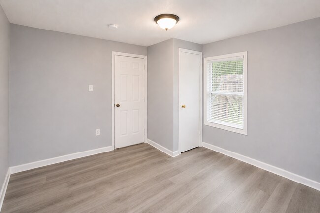 Building Photo - Updated Multi-Bedroom Home | Brand-New Deck | Circular Drive | Triad Premier Realty