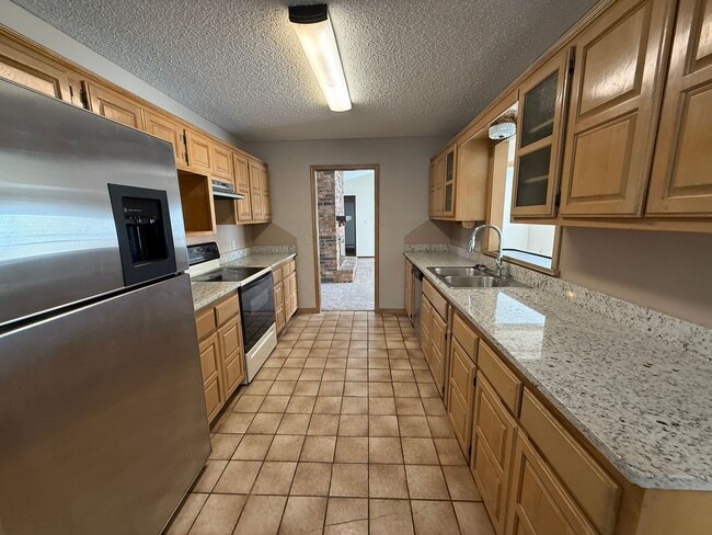 Building Photo - Huge Living Area, Storage Shed, Fenced Yard 3 bedroom Home