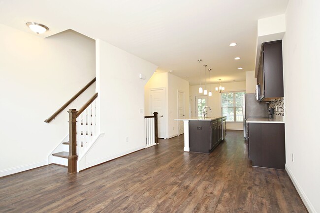 Building Photo - Light-Filled Townhome With Utilities Inclu...