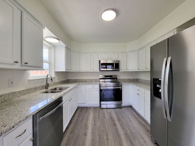 Building Photo - This fully renovated 3-bedroom, 2-bath home features a modern kitchen, large master suite with a ...