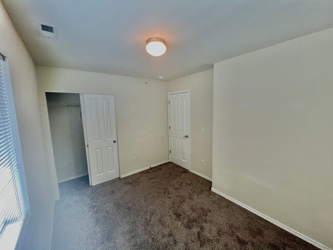 Building Photo - Spacious Condo Available Now!