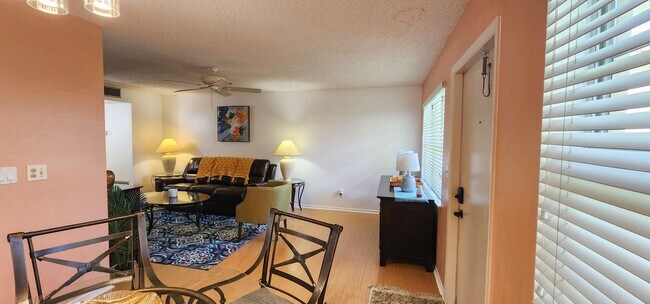 Building Photo - Coming Soon! Beautifully furnished 1 bedroom 1.5 bath condo