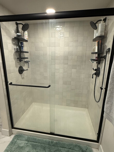 Two shower heads - 3423 N Saint Paul St