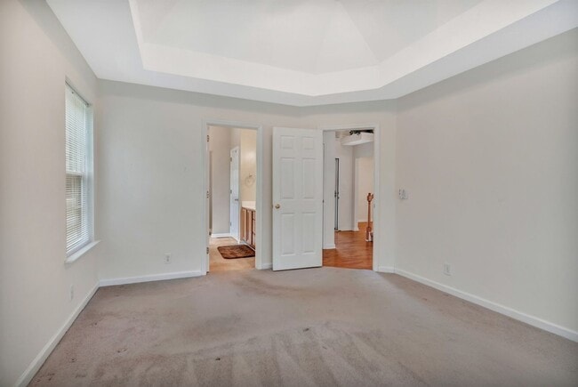 Building Photo - One acre lot with first floor suite in bea...