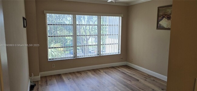 Building Photo - 10777 W Sample Rd