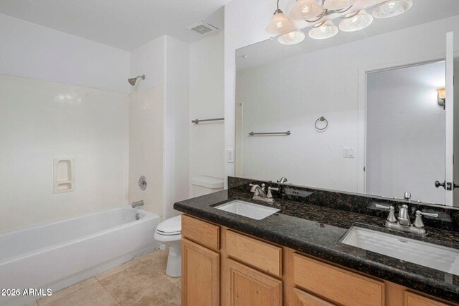 Building Photo - 10307 E Caribbean Ln