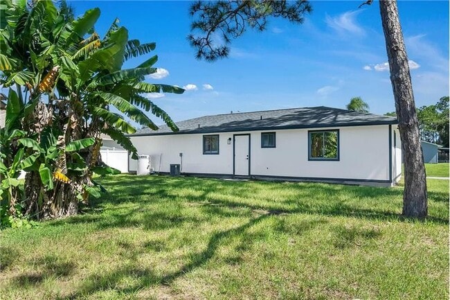 Building Photo - 322 Ixora Ave NW
