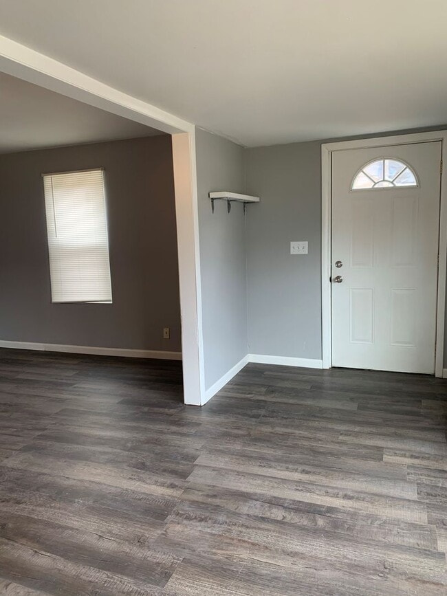 Building Photo - Move-In Ready 2BR Ranch – Fresh Paint, New Floors, & Off-Street Parking!