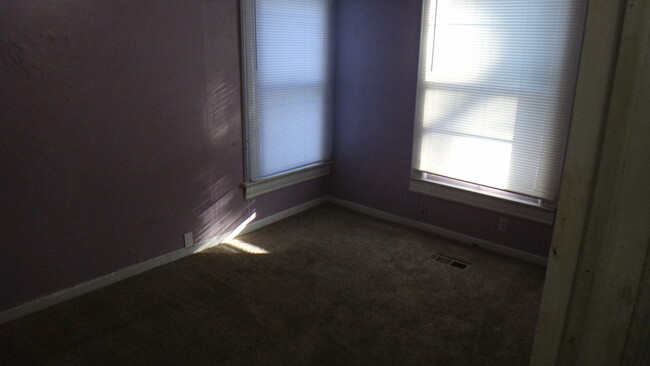 Master bedroom new outlets and light fixture. - 1307 SW Mulvane St