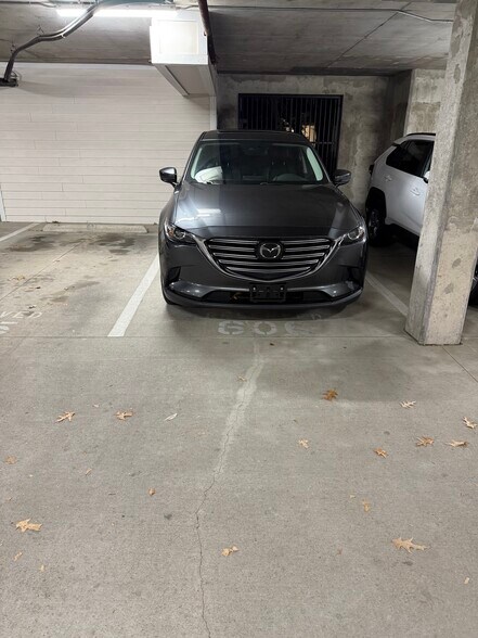 Your assigned parking spot sheltered in garage - 1755 Central Park Rd