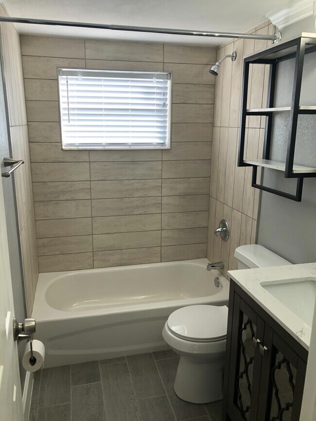 Building Photo - WALK TO THE BEACH FROM YOUR TOTALLY UPDATED, BEAUTIFUL CONDO!