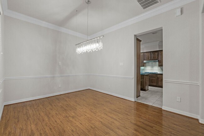 Building Photo - Luxury Townhome with Attached Garage & Outdoor Entertaining Area - $100 off first and second mont!