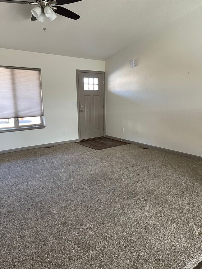 Building Photo - 3 Bedroom 2 Bath With a 2 car garage