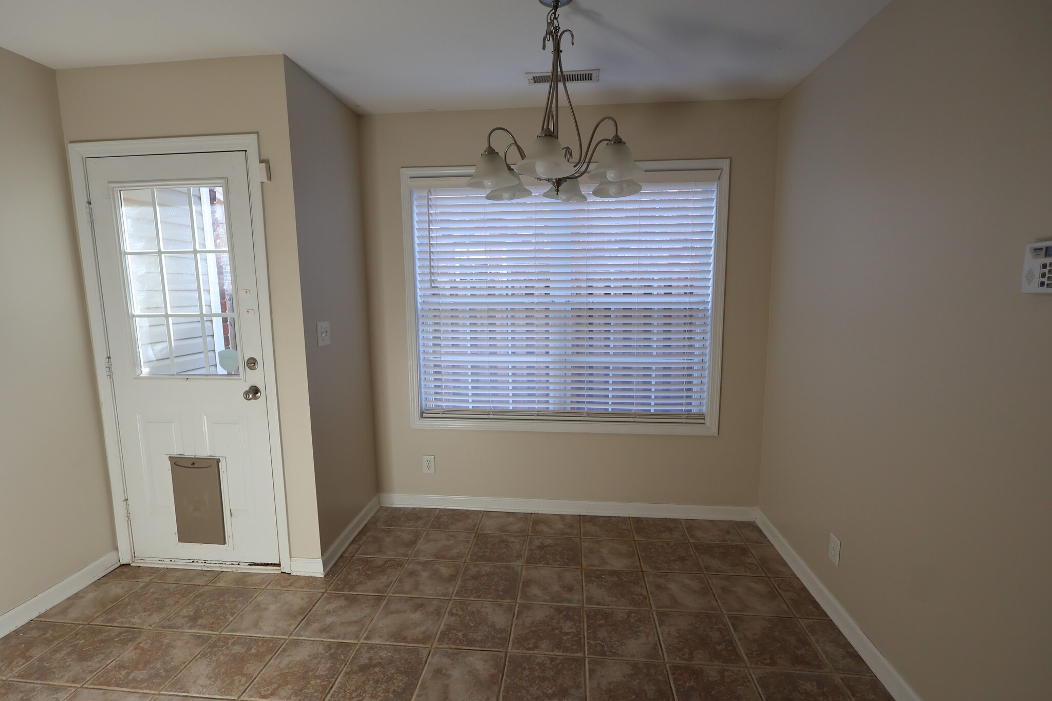 Dining Area and Side Door - 999 Culverson Ct