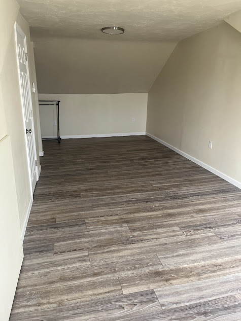 Bedroom with stairs to the left - 122 3rd St