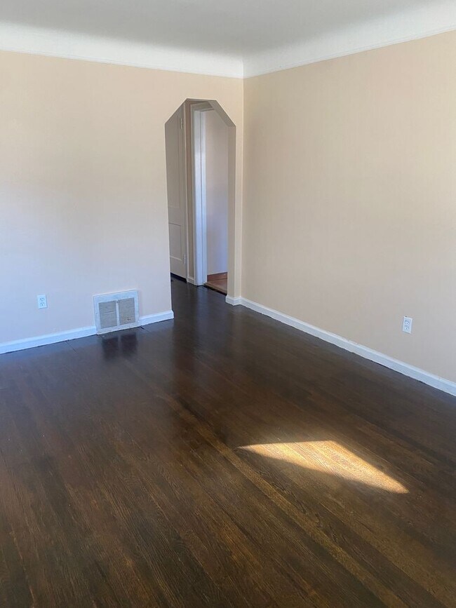 Building Photo - Three bedroom 1 bath bungalow with finished basement and 2 car garage