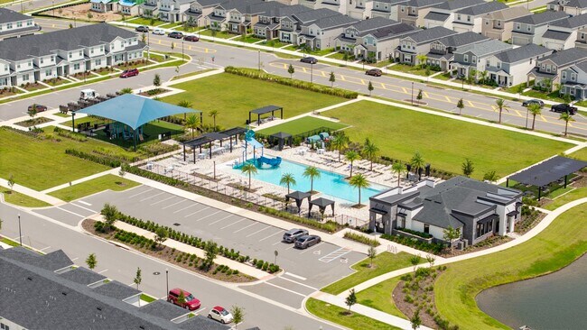 Building Photo - 3BR Center Lake Townhome | 2-Car Garage, Loft & Resort-Style Amenities