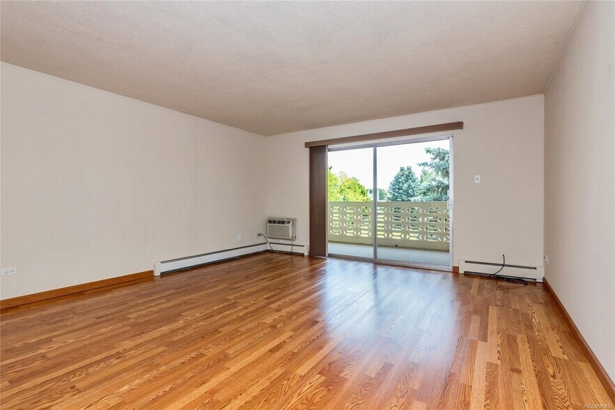 Building Photo - 9340 E Center Ave