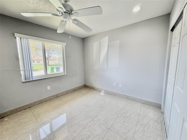 Building Photo - 10991 NW 30th Pl