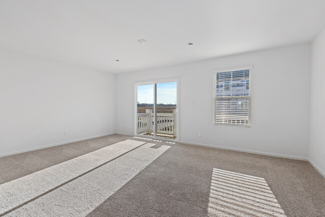 Living room with balcony - 8685 Orchid Dr