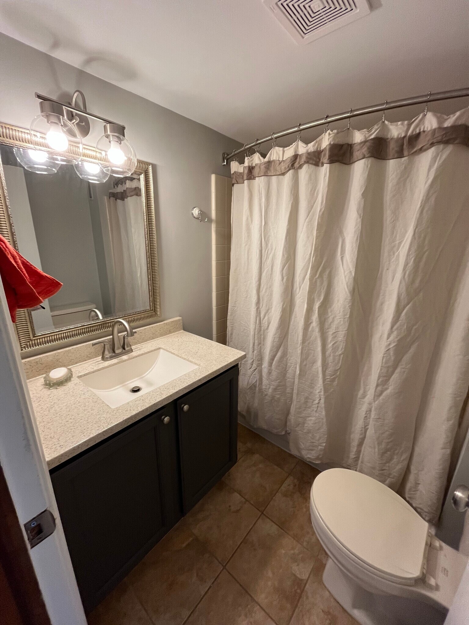 Full bathroom with tub - 9045 Millward Ave