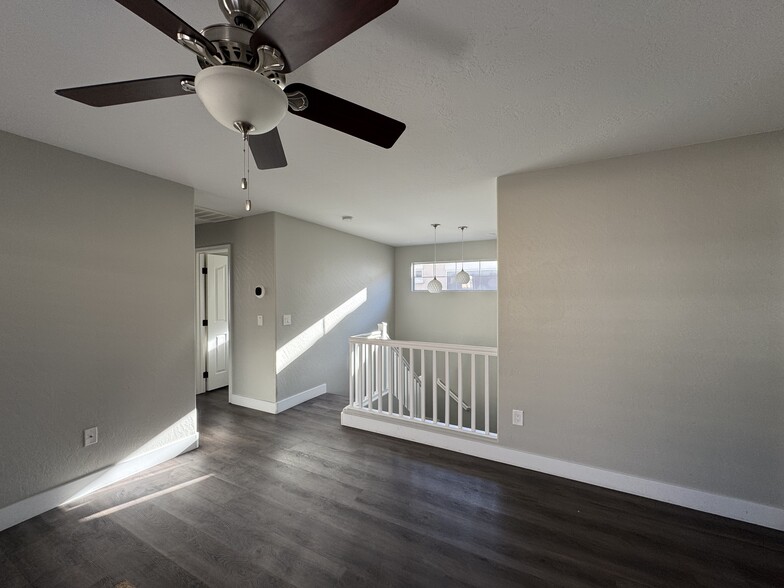 Loft at Stairwell, Hall to Secondary Bedrooms and Bathroom - 524 W Mountain Sage Dr