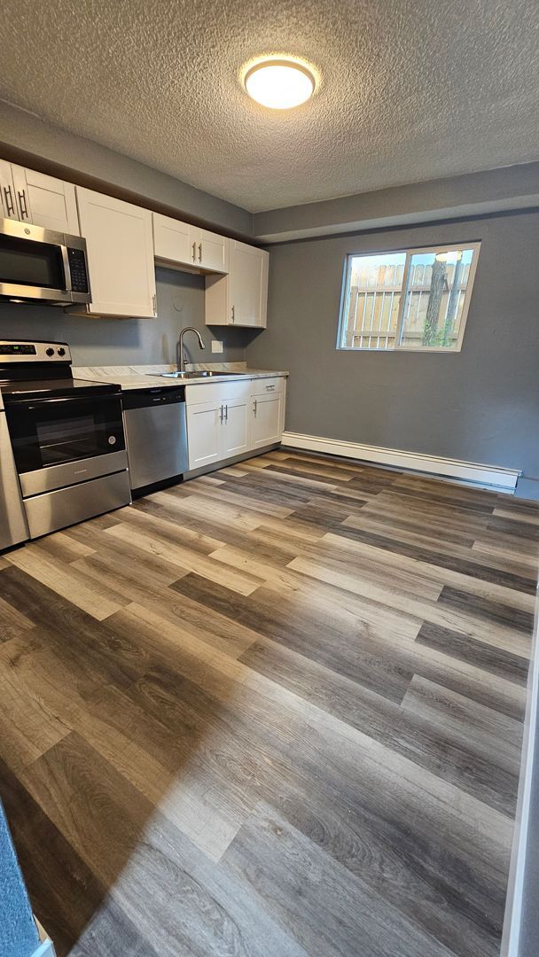 Building Photo - $1195 - 2BR/1BA Pet-Friendly 4Plex near Me...