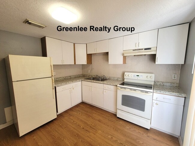 Building Photo - Cozy 2 Bed/1 Bath Duplex Apt with a Carport and Large Fenced Back Yard!