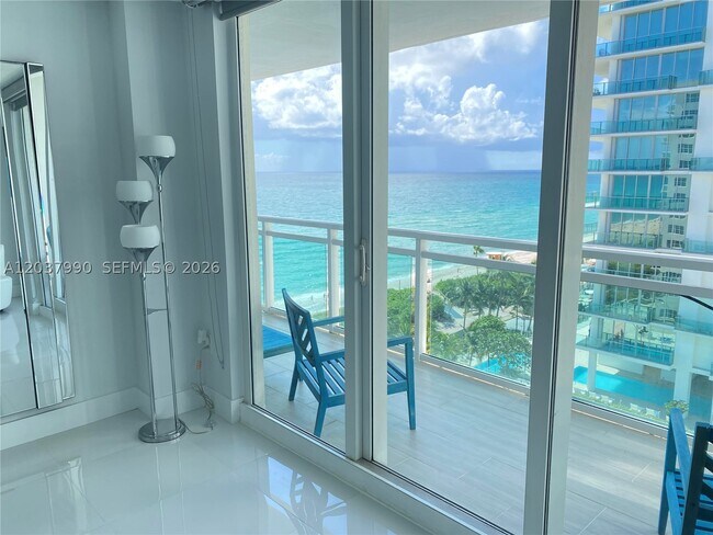Building Photo - 6917 Collins Ave