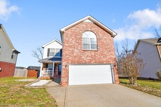 Building Photo - Pet Friendly Three Bedroom with Bonus!