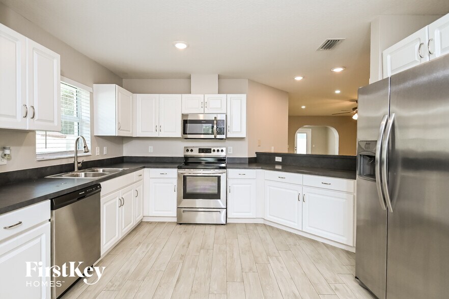 Building Photo - 11202 Hidden Breeze Dr