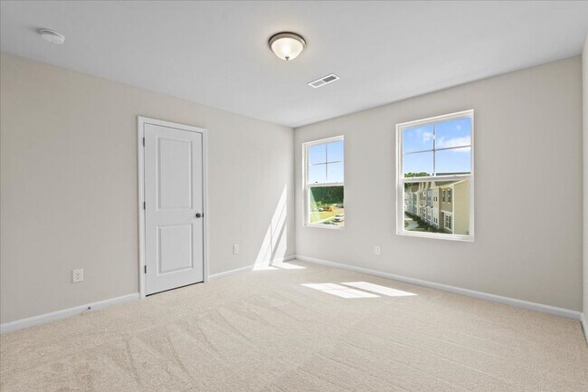 Building Photo - Be the 1st to live in this stunning, never...
