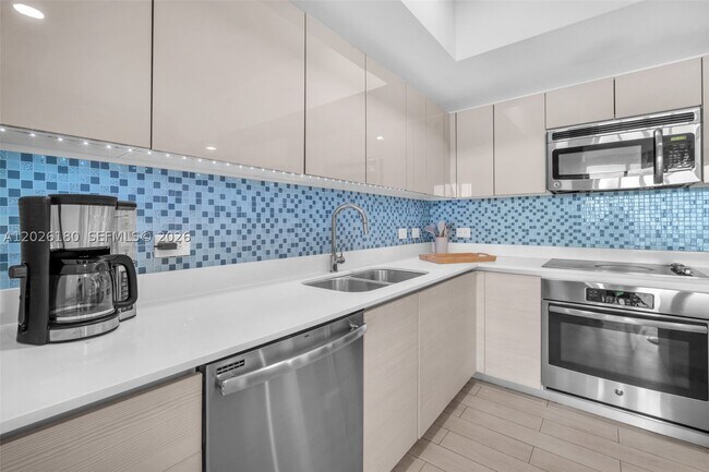 Building Photo - 2602 E HALLADALE T3105