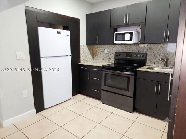 Building Photo - 325 SW 63rd Ave
