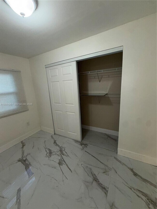 Building Photo - 6497 W 8th Ln