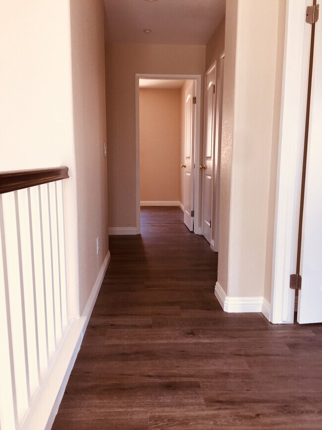 upstairs hallway - 504 Robins Pl