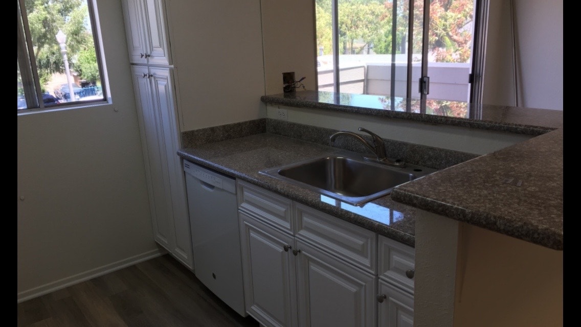 Apt. B, Kitchen with Bar Countertop. - 831 N Zeyn St