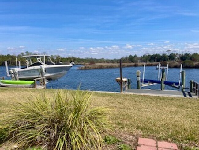 Building Photo - Waterfront condo with community pool!