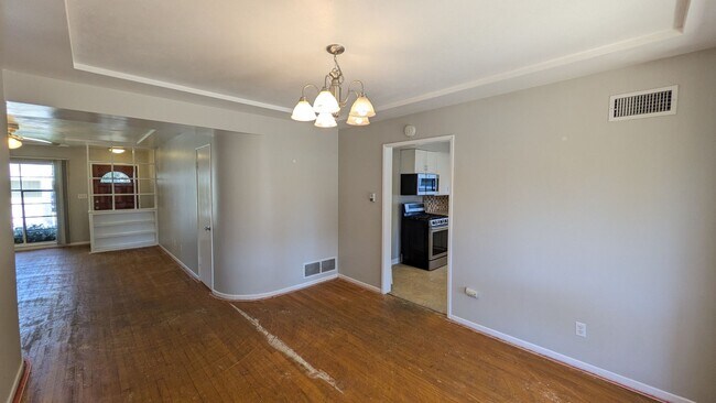 Building Photo - Available in July - New flooring and paint