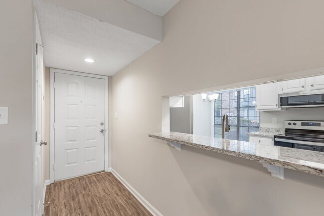 Building Photo - Discover Your Lakeside Oasis: 2 Bedroom Condo at Harris Lake