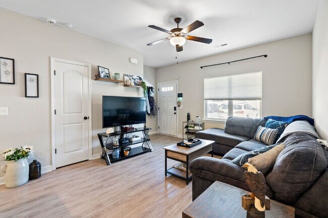 Building Photo - Available Now! Enjoy low-maintenance coastal living in this beautiful 2-bedroom, 2.5-bath townhom...